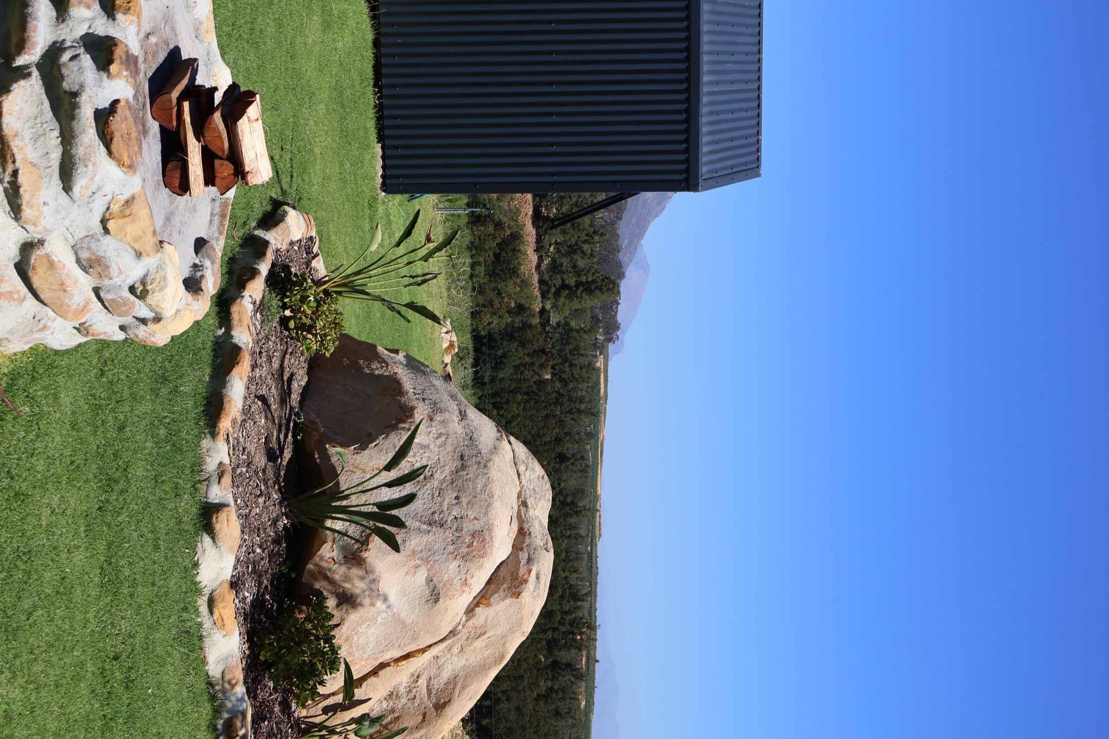Bundles of firewood available for the fireplace and hot tub