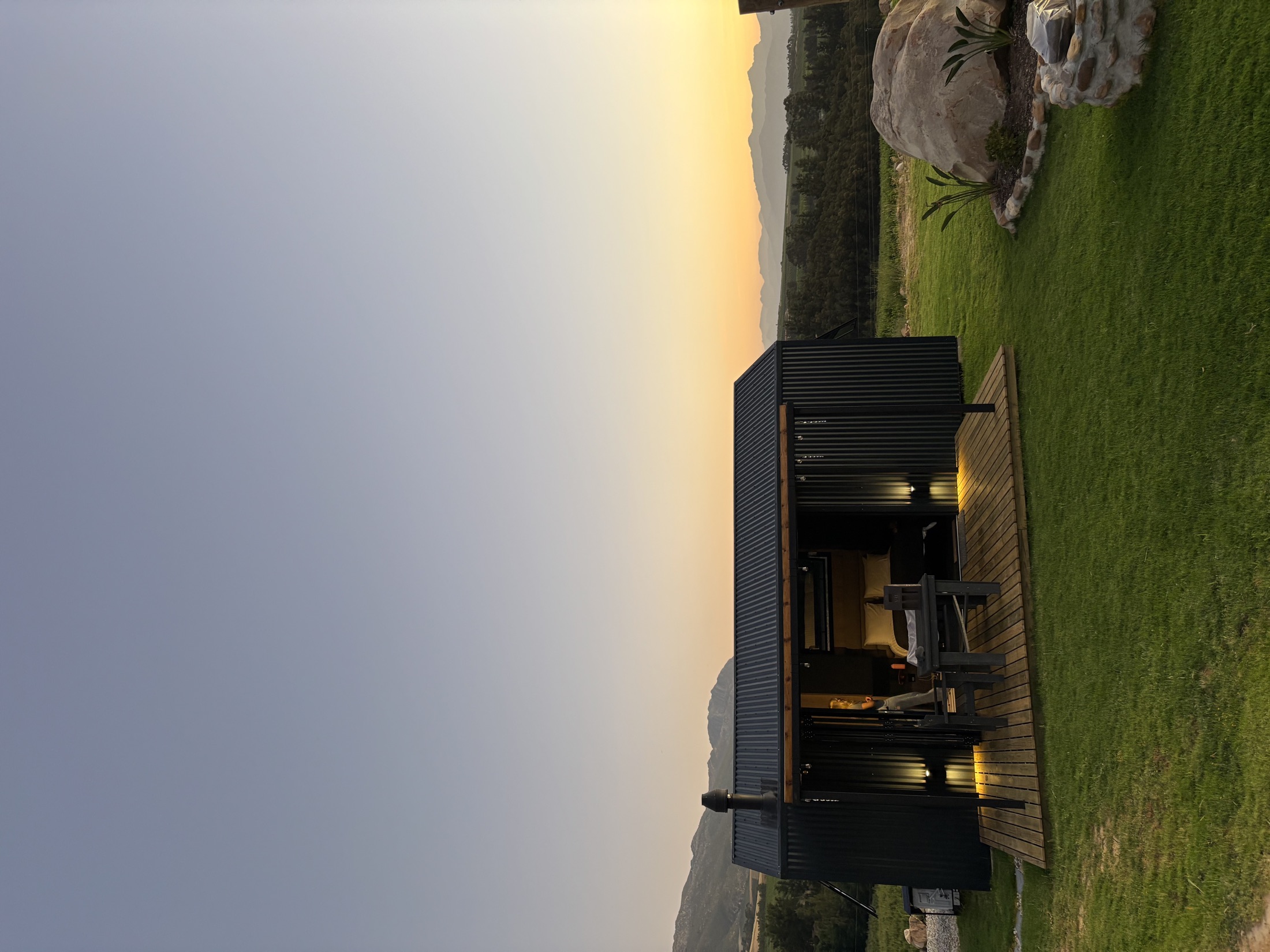 Vibrant sunset over the mountains at Werda Cabin